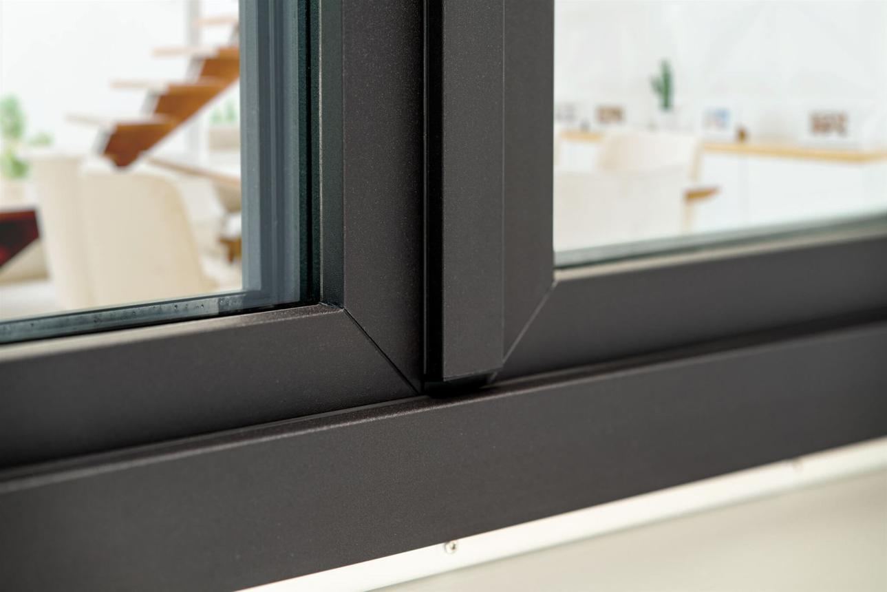 Close-up of a mitred aluminium profile in a matte black finish
